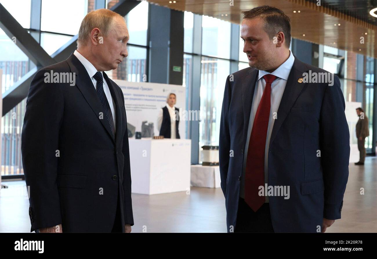 Veliky Novgorod, Russia. 21st Sep, 2022. Russian President Vladimir Putin, left, speaks with Novgorod Region Governor Andrei Nikitin, right, during a visit to Yaroslav-the-Wise Novgorod State University, September 21, 2022 in Veliky Novgorod, Russia. Credit: Gavriil Grigorov/Kremlin Pool/Alamy Live News Stock Photo