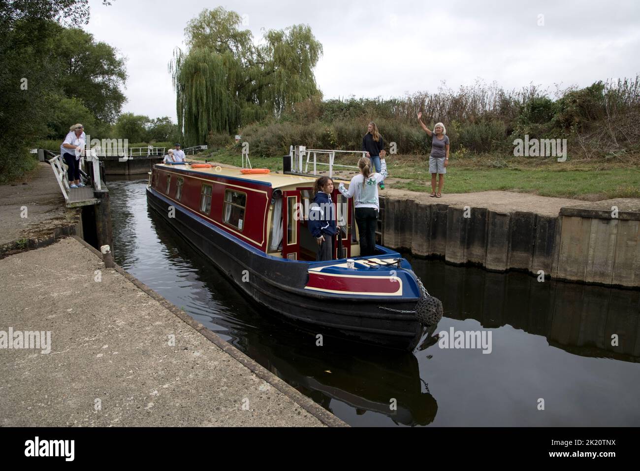 family enjoying trip on narrowboat on River Avon Warwickshire UK Stock Photo