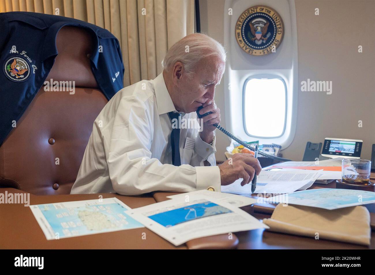 Air Force One, United States. 19th Sep, 2022. U.S. President Joe Biden speaks by phone from aboard Air Force One with Puerto Rico Governor Pedro Pierluisi as Hurricane Fiona struck the island causing catastrophic damage, September 19, 2022, over the Atlantic Ocean. Biden made the call while returning from the State Funeral for Queen Elizabeth II in England. Credit: Adam Schultz/White House Photo/Alamy Live News Stock Photo