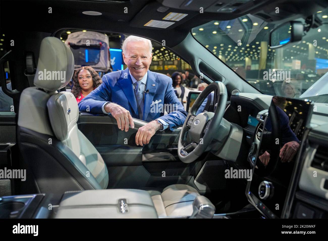 Detroit, United States of America. 14 September, 2022. U.S President Joe Biden, looks inside the Cadillac Lyriq electric vehicle during a visit to the 2022 North American International Auto Show at Huntington Place Convention Center, September 14, 2022 in Detroit, Michigan.  Credit: Adam Schultz/White House Photo/Alamy Live News Stock Photo