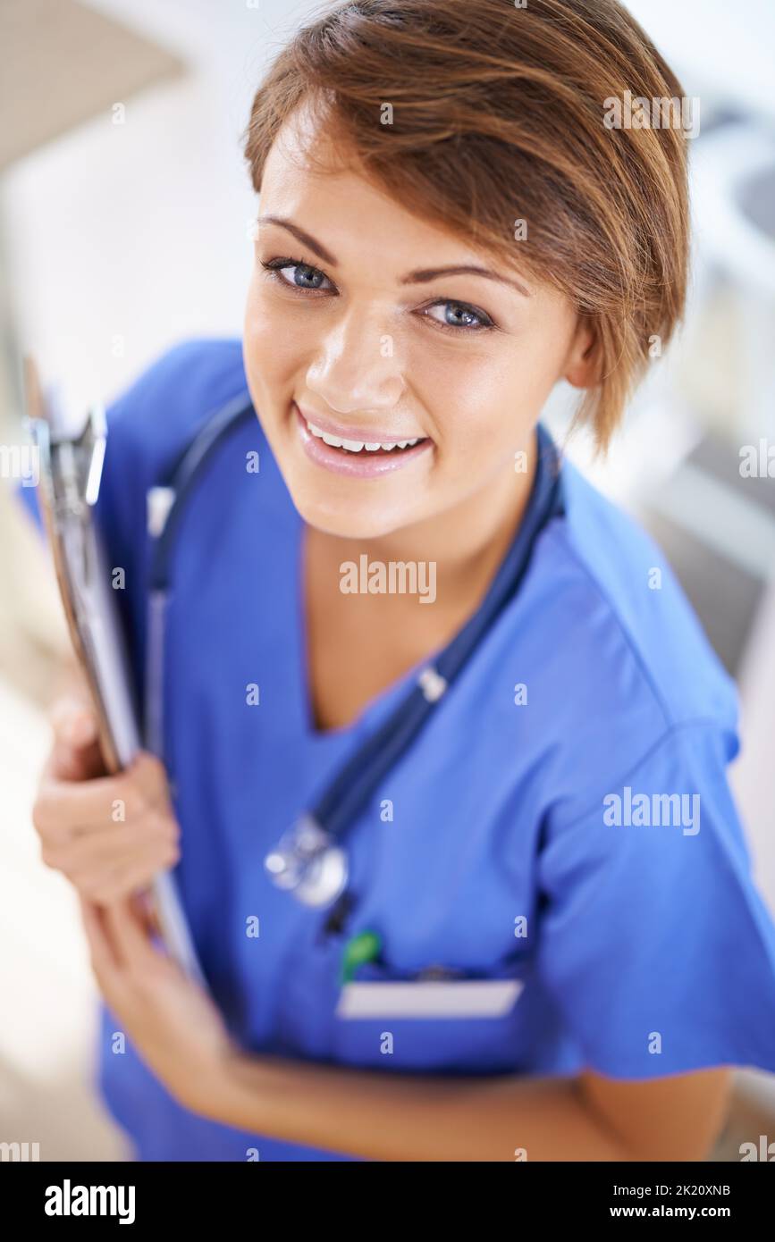 Portrait young nurse in scrubs hi-res stock photography and images - Alamy