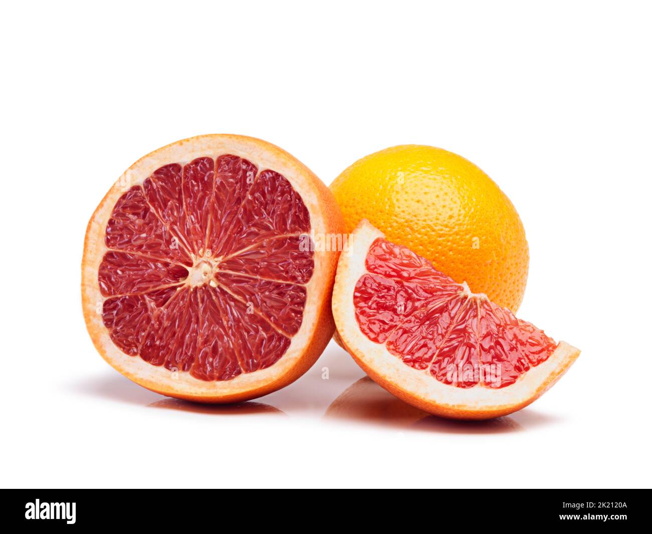 Juicy nutrients. Studio shot of a cut grapefruit with an orange in the background. Stock Photo