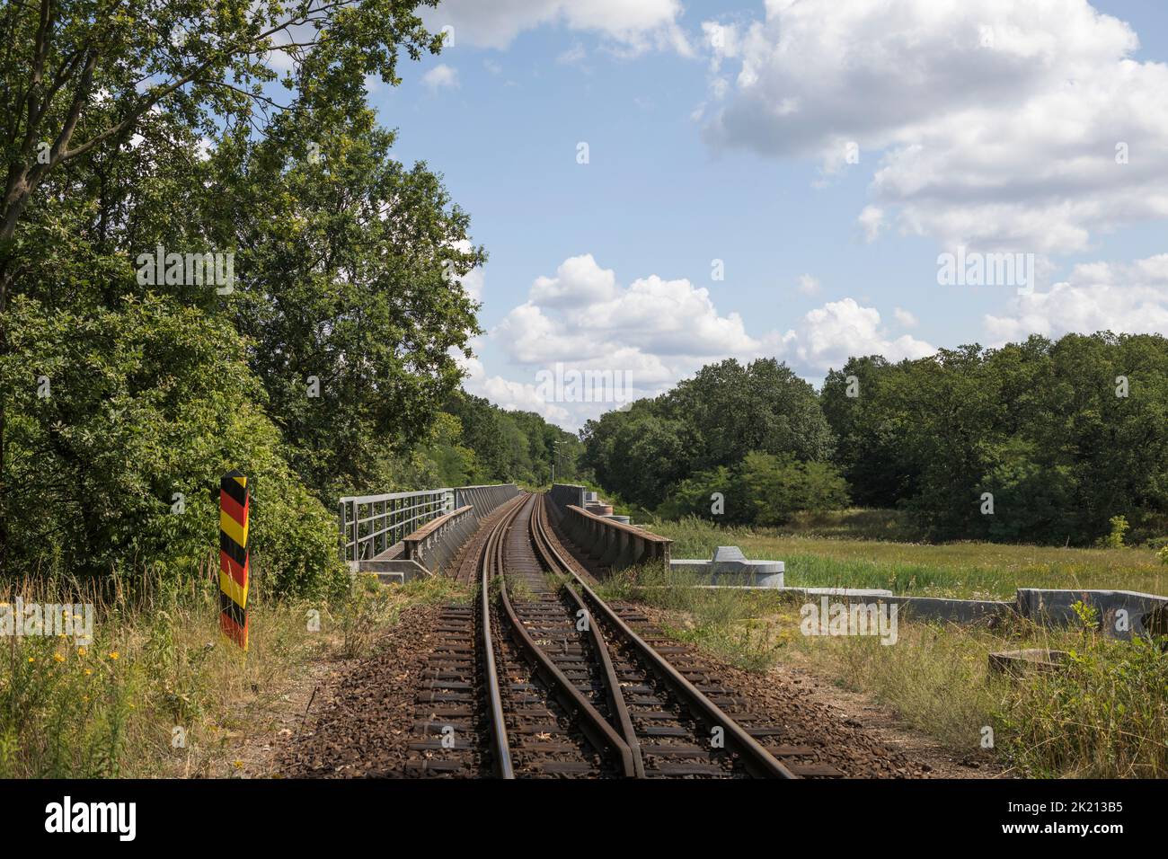 Railway bridge over river Neisse crossing the border from Germany to Poland Stock Photo