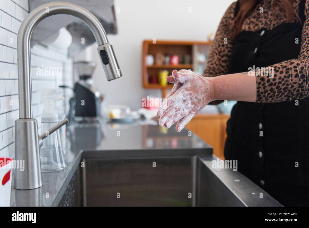 Washing Hands In Kitchen