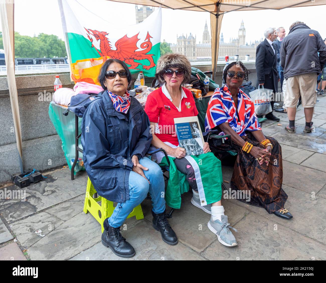 Super Royal fans camp along River Thames opposite the Parliament today for the procession of Queen Elizabeth II’s coffin tomorrow. Vanessa Nathakumara Stock Photo