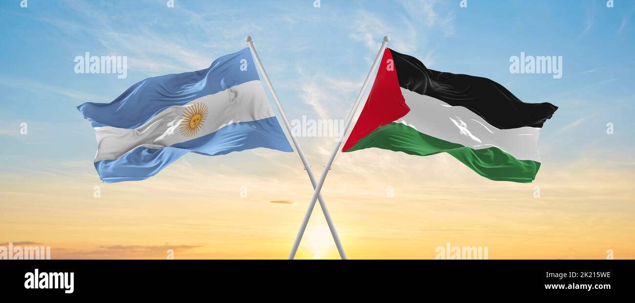 crossed national flags of Argentine and Palestine flag waving in wind ...
