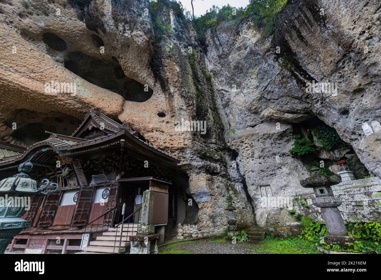 Stone Buddha Statues of Ooyaji Temple - Oyagi Temple is carved into a vertical rock face of Oya stone and the resulting cavern holds a series of impre Stock Photo