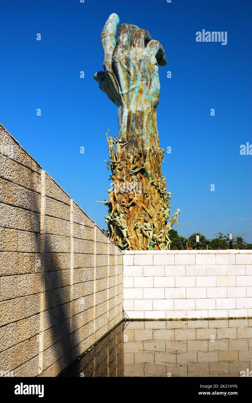 The Holocaust Memorial, in Miami Beach, Florida, depicts an arm reaching for the sky while smaller sculpture show people in despair Stock Photo