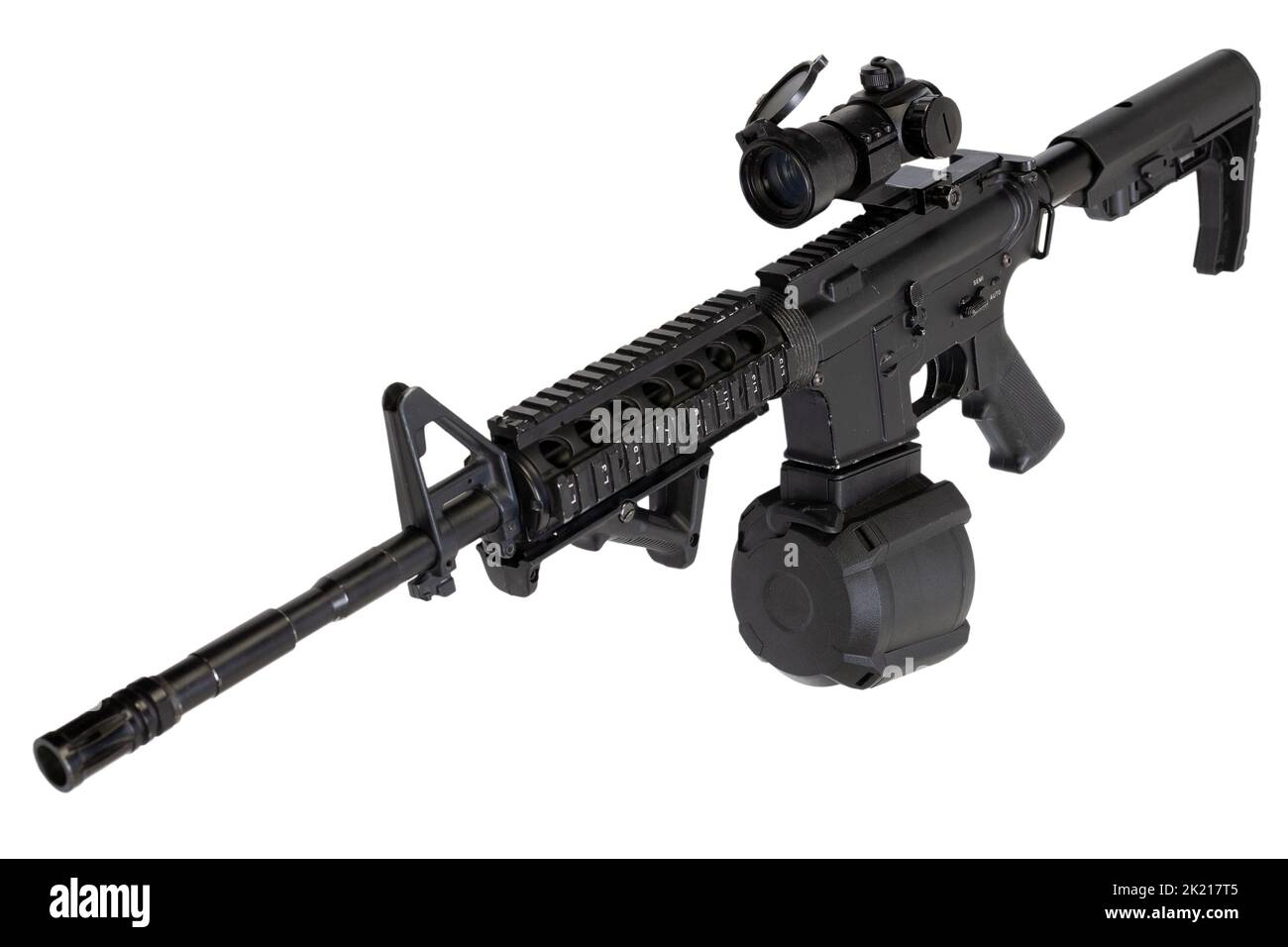 M4 assault rifle with optic scope and drum magazine isolated on a white ...