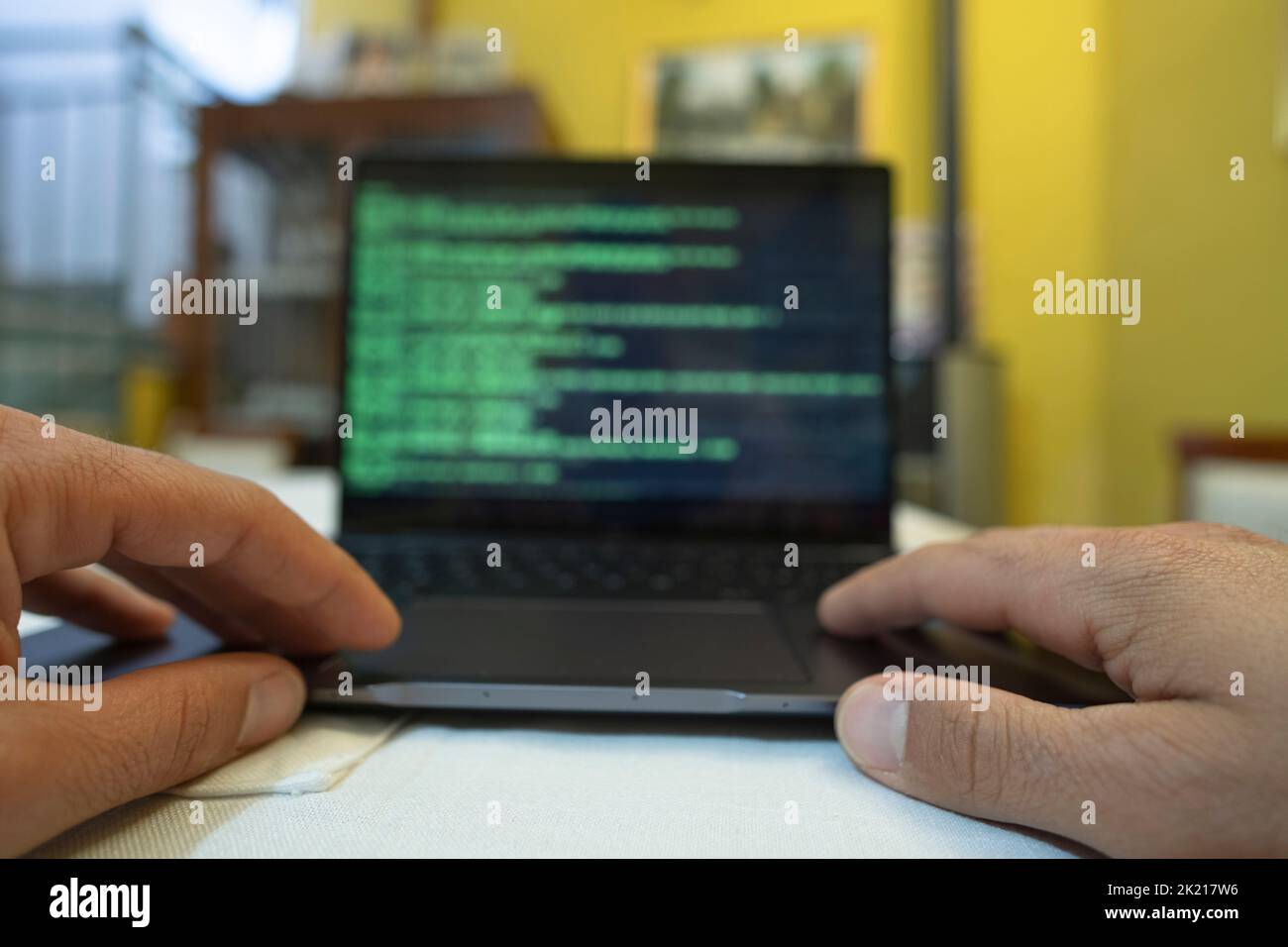 Hacker man working on pc laptop privacy data decript,cyber security hacking attack Stock Photo