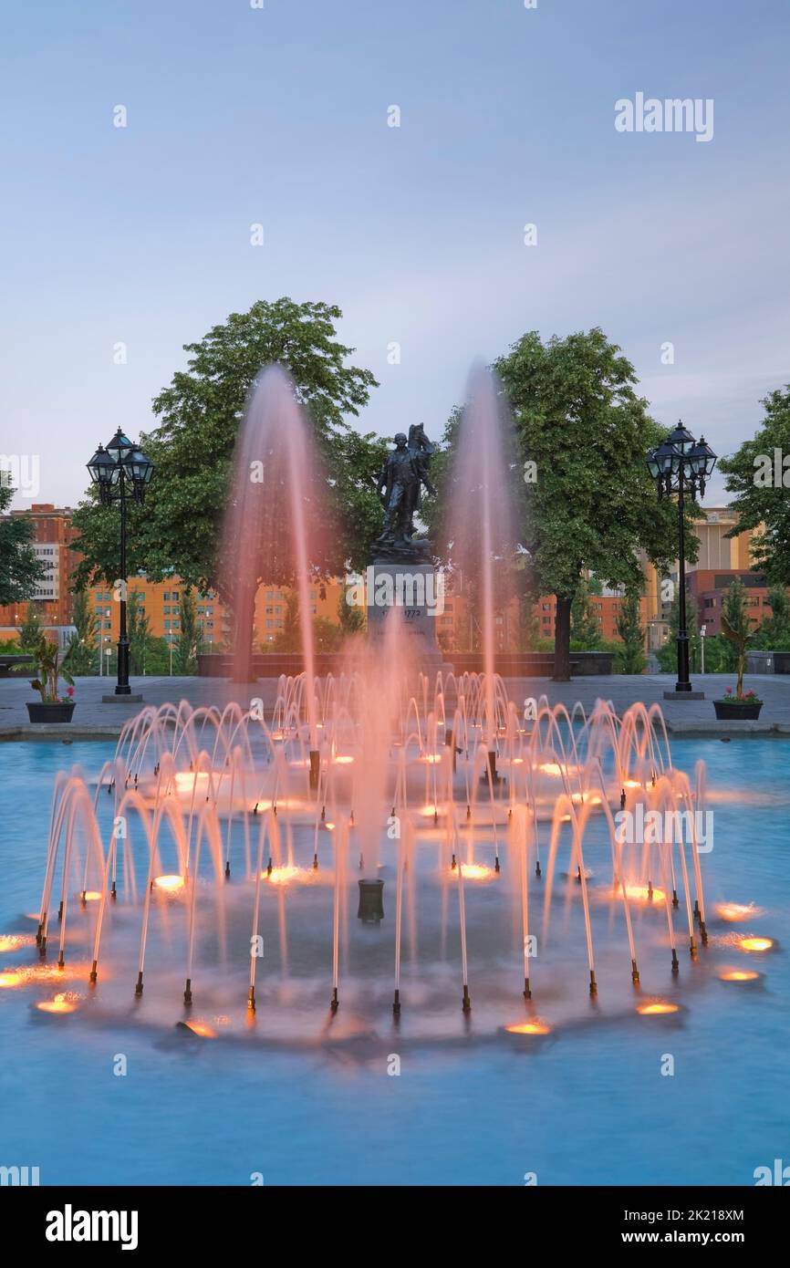 Water Fountain and statue at Place Vauquelin at dawn in spring, Old Montreal, Quebec, Canada Stock Photo