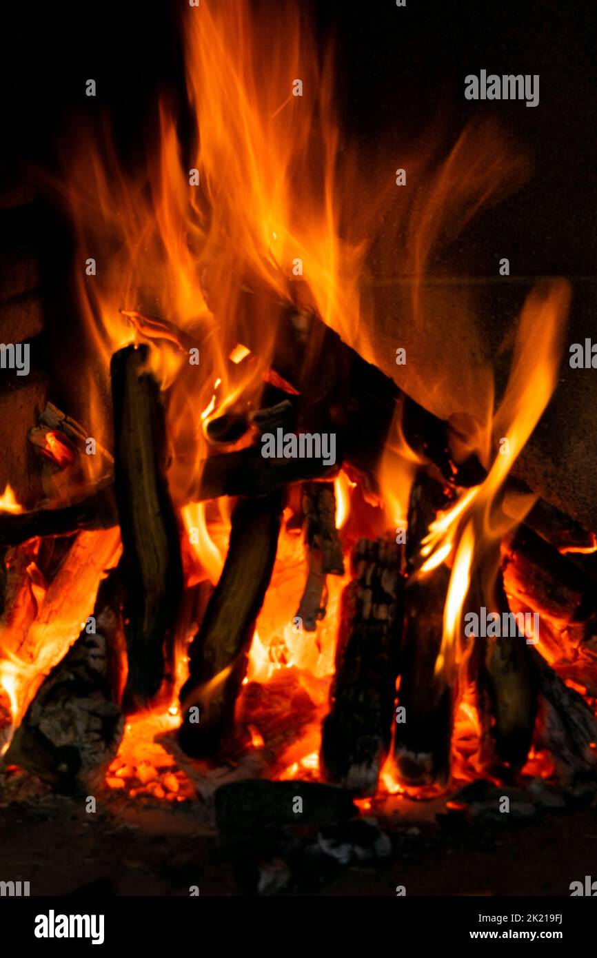 Logs of wood burning in a bonfire Stock Photo