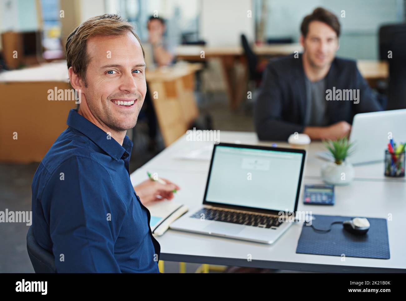 Developing tomorrows tech today. a designer at their workstation in an office. Stock Photo