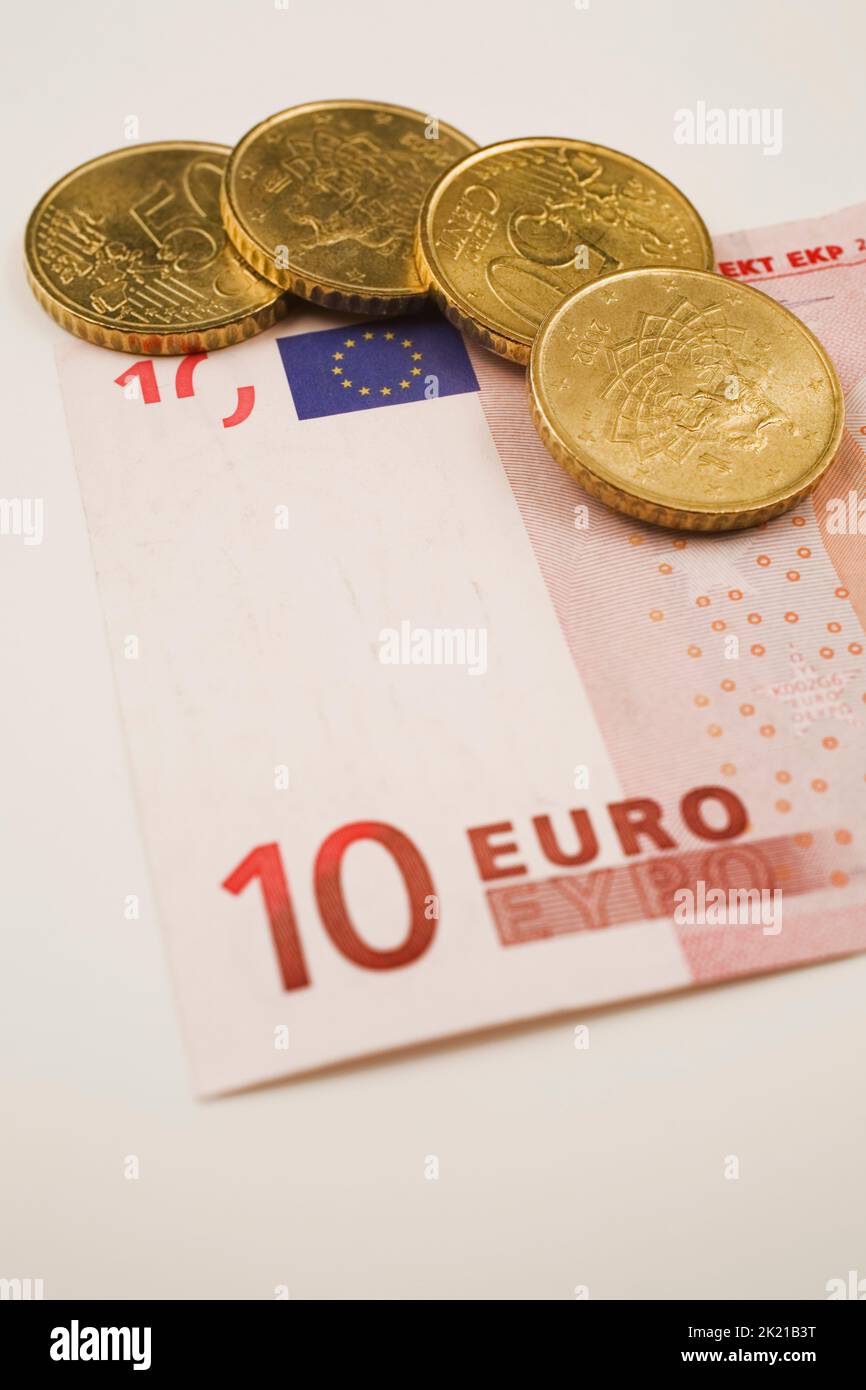 Close-up of euro coins on top of a 10 euro currency bank note, Studio Composition, Quebec, Canada Stock Photo