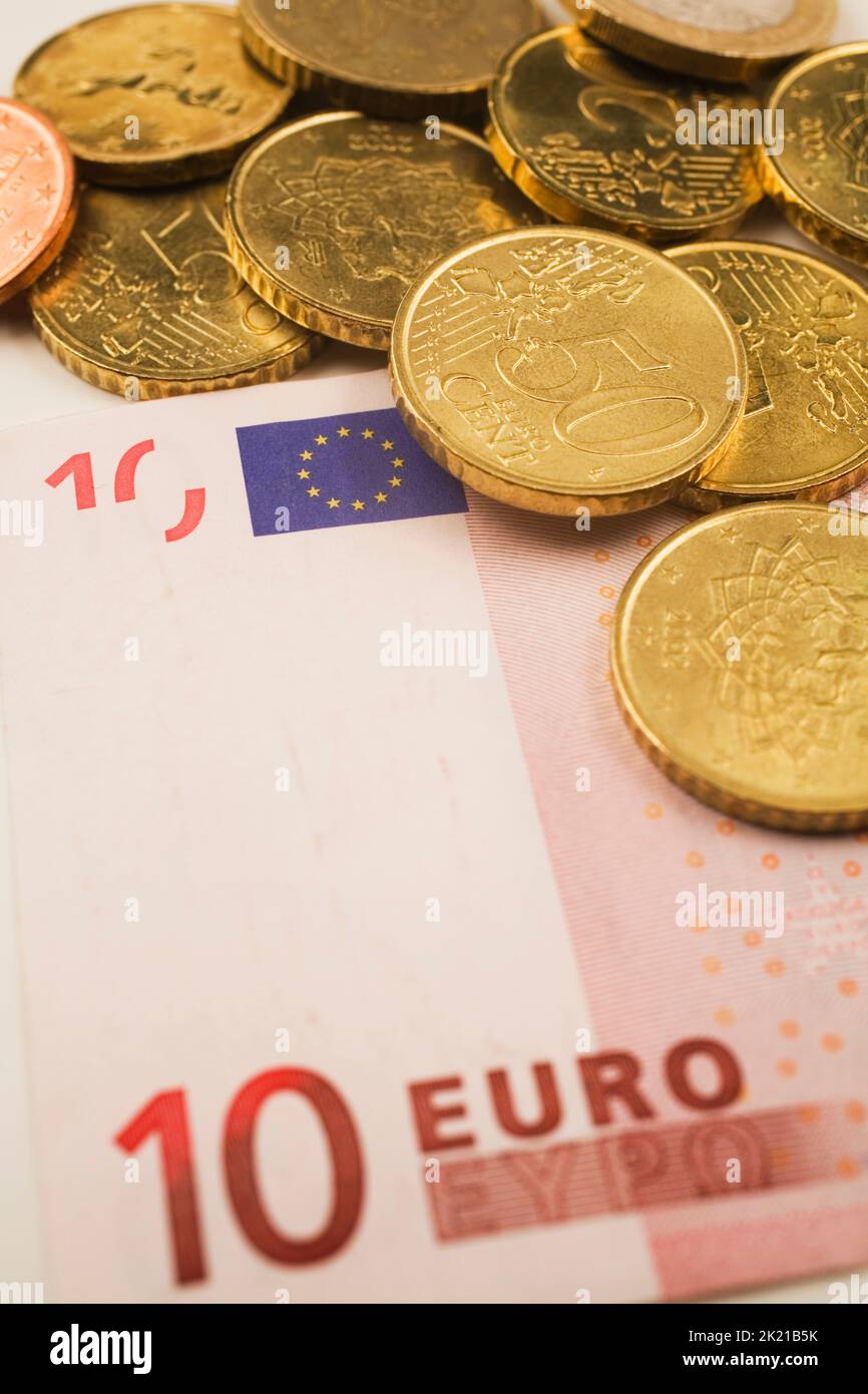 Close-up of euro coins on top of a 10 euro currency bank note, Studio Composition, Quebec, Canada Stock Photo