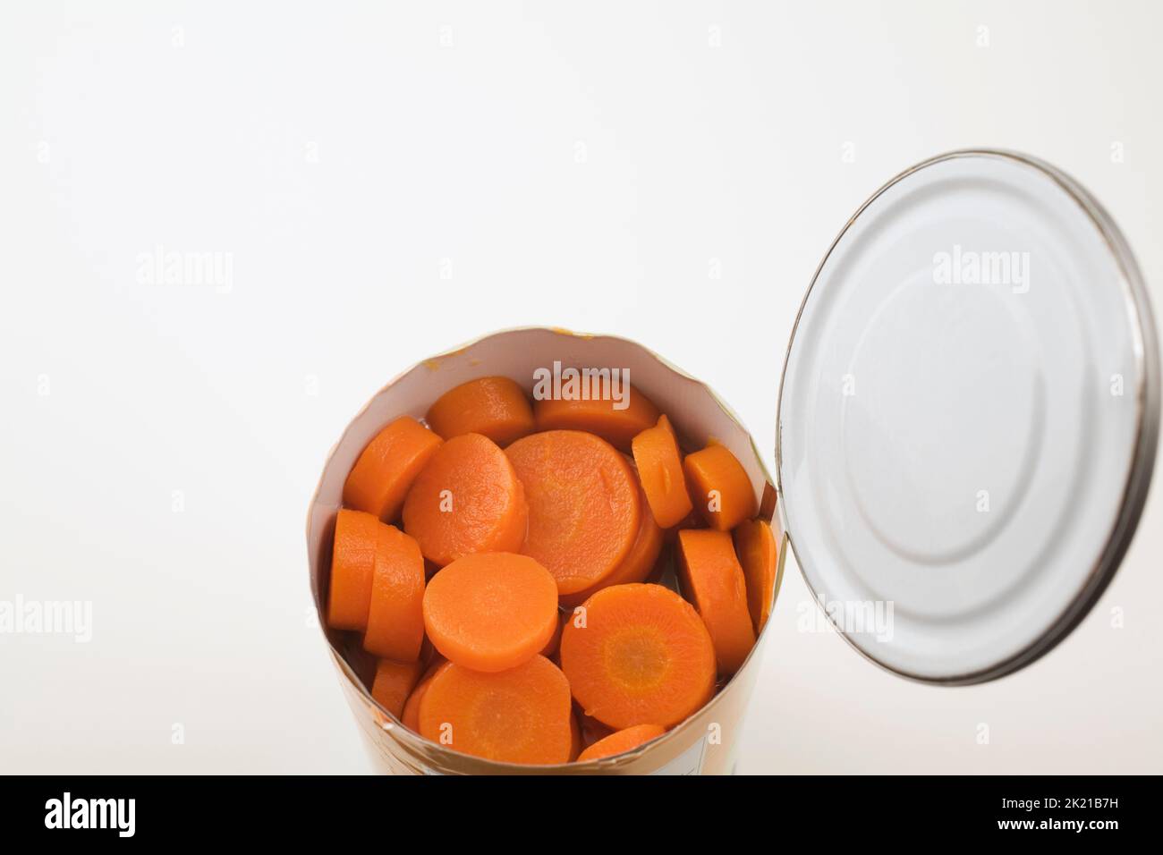 Close-up of sliced carrots in tin can on white background, Studio Composition, Quebec, Canada Stock Photo