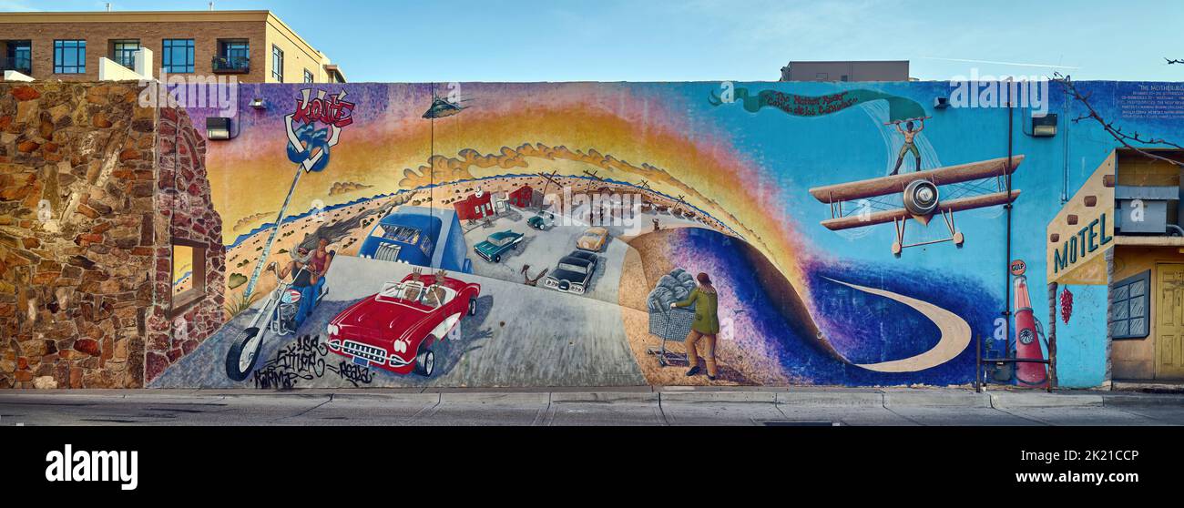 Artist Joe Stephenson's mural in downtown Mother Road depicts historic U.S. Route 66 that runs through the city of Albuquerque, the largest city in Ne Stock Photo