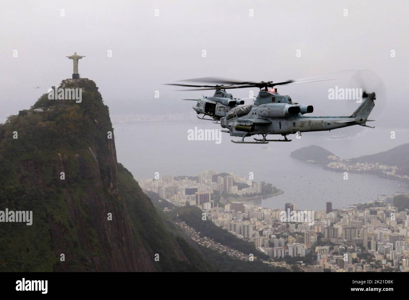 Rio de Janeiro, Brazil. 12th Sep, 2022. U.S. Marines with Marine Light Attack Helicopter Squadron (HMLA) 773, 4th Marine Aircraft Wing, Marine Forces Reserve in support of Special Purpose Marine Air-Ground Task Force UNITAS LXIII, conduct flight operations near the Christ the Redeemer statue at Corcovado Mountain, Rio de Janeiro, during exercise UNITAS LXIII, Septembert. 12, 2022. UNITAS, which is Latin for unity was conceived in 1959 and has taken place annually since first conducted in 1960. This year marks the 63rd iteration of the worlds longest-running annual multinational maritime Stock Photo