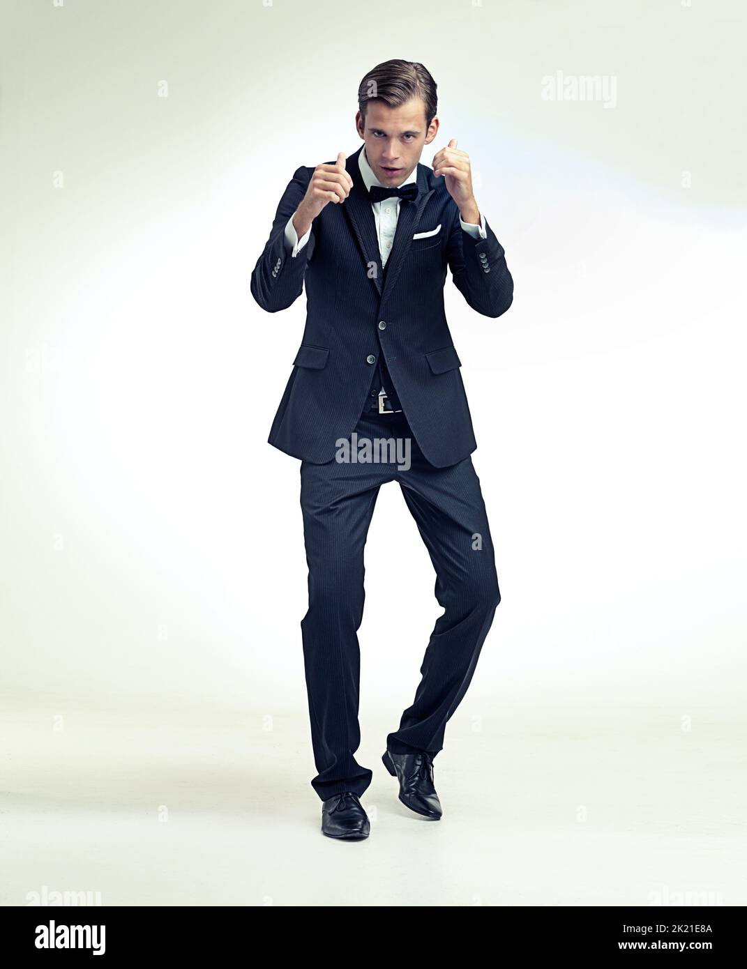 The champ is here. A full length studio portrait of a young man in a