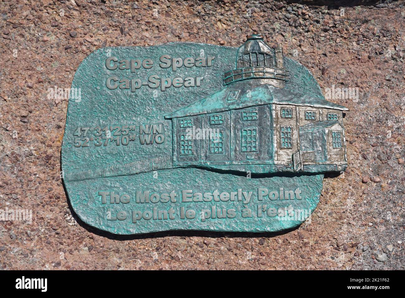 Cape Spear, Newfoundland, Canada: A copper marker in English and French notes the location of the most easterly point of land in North America. Stock Photo
