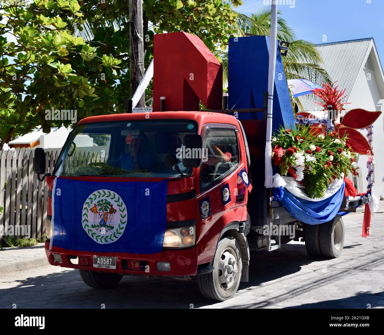 Two golf carts and the Miss San Pedro truck float, adorned with the
