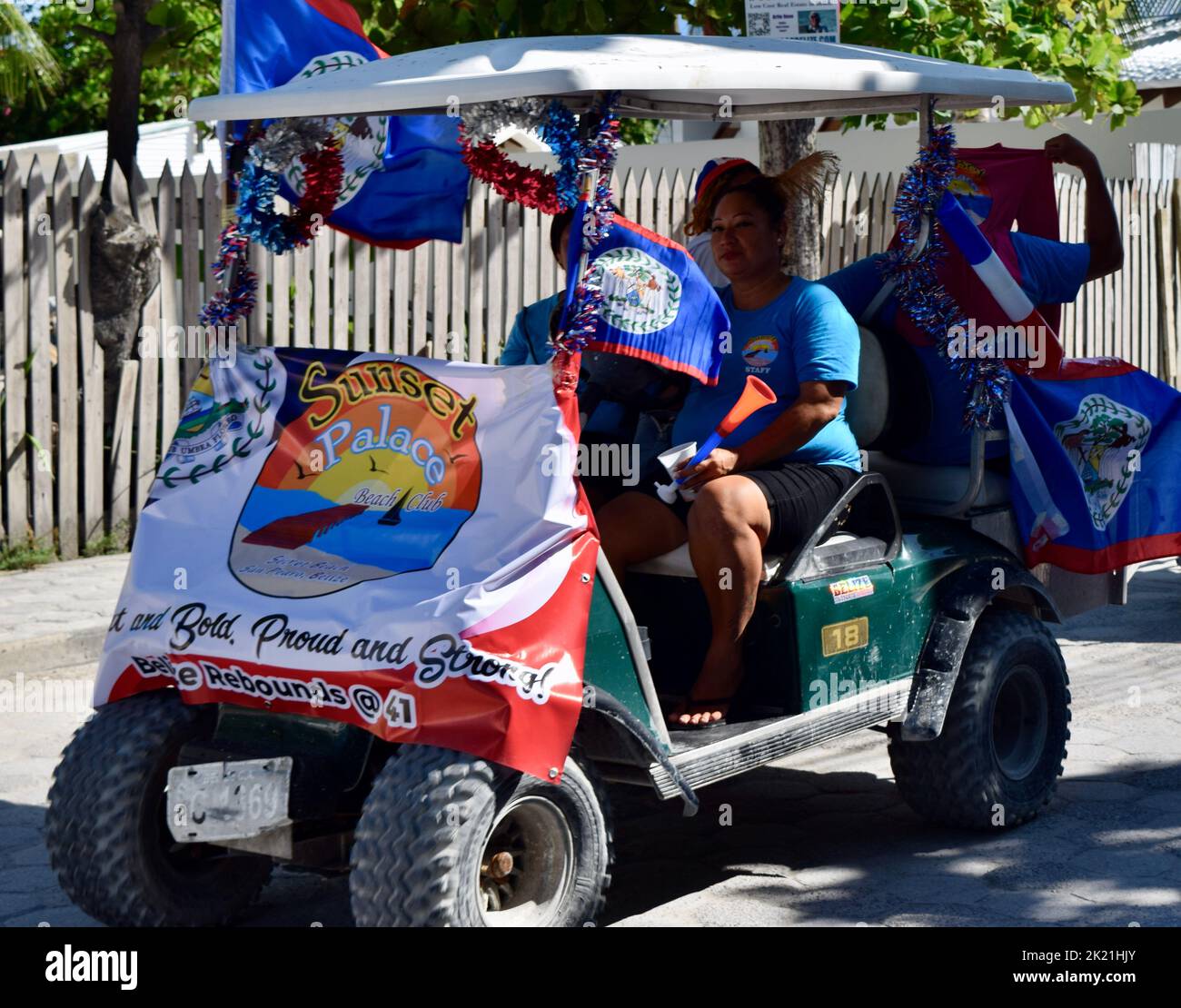 A colorfully decorated golf cart in the San Pedro, Belize Carnival 2022