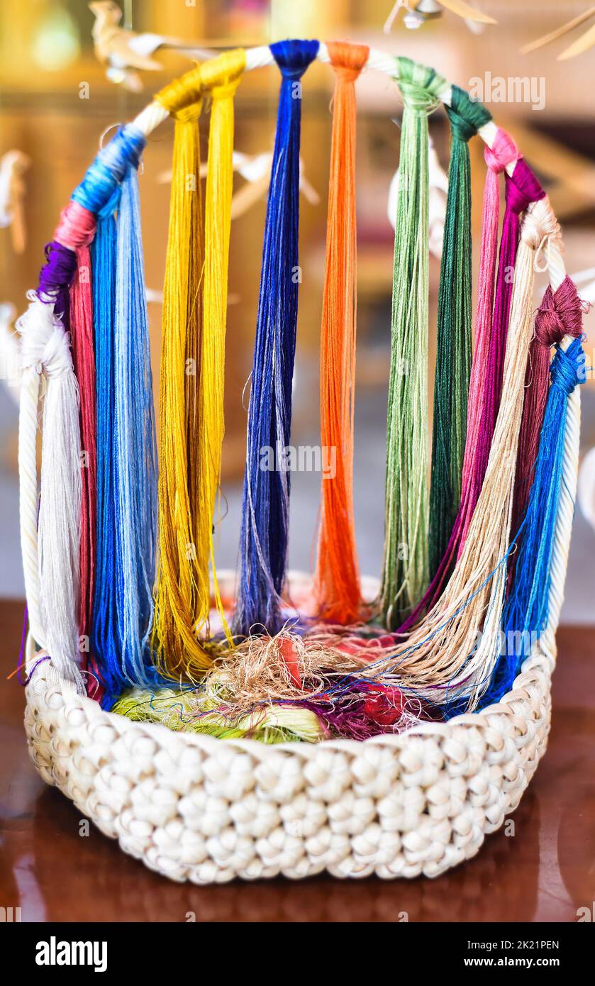 Many multicolored silk thread prepared for making picture embroidery in vietnamese culture Stock Photo