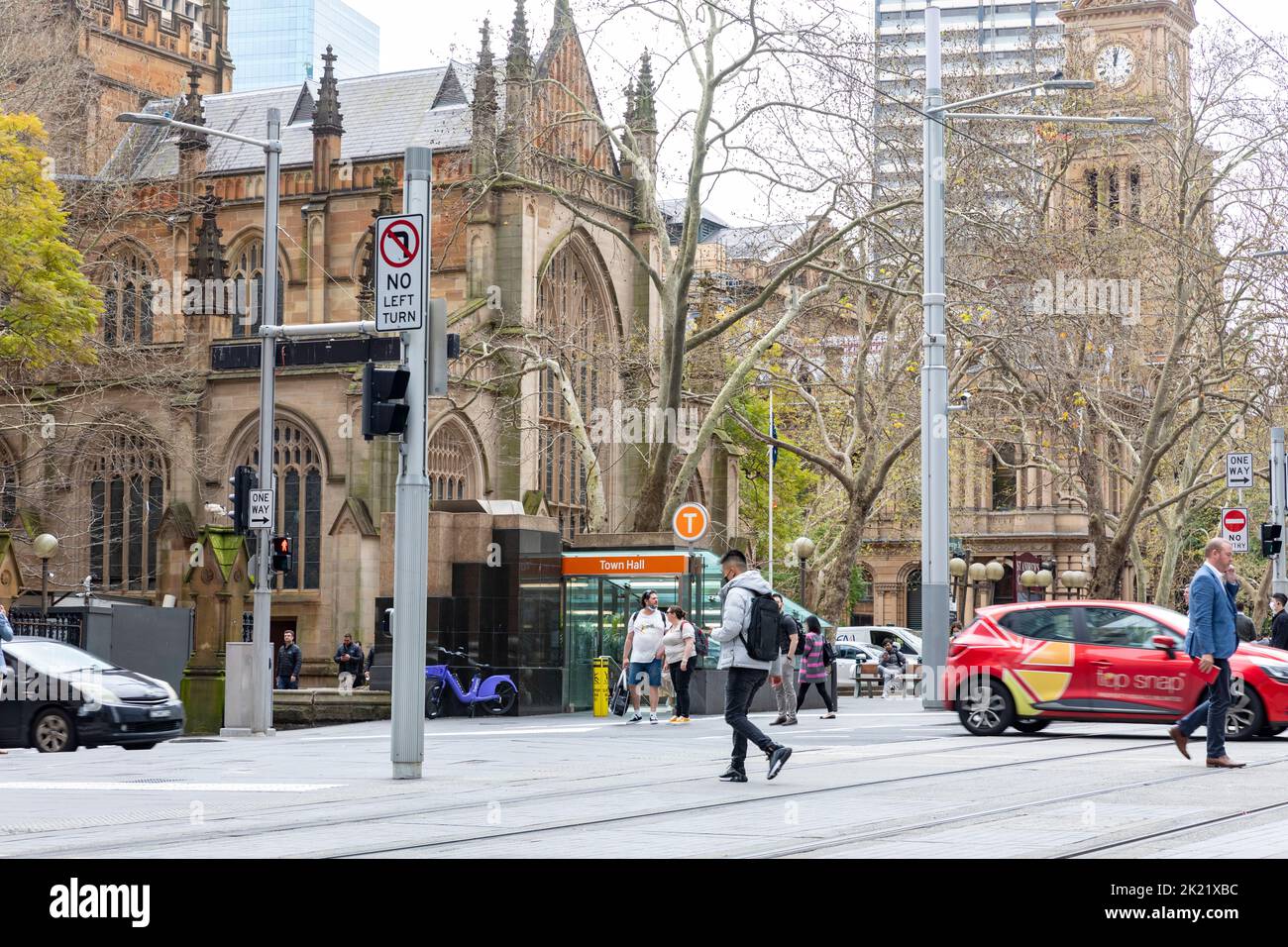 George street in Sydney city centre with council town hall building, church and town hall railway station,Sydney CBD,NSW,Australia Stock Photo