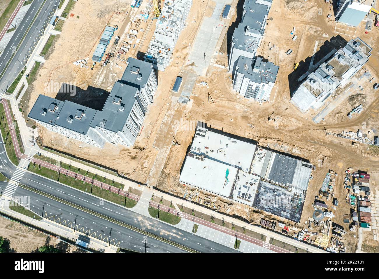 aerial view of new residential district with multilevel parking garage under construction Stock Photo