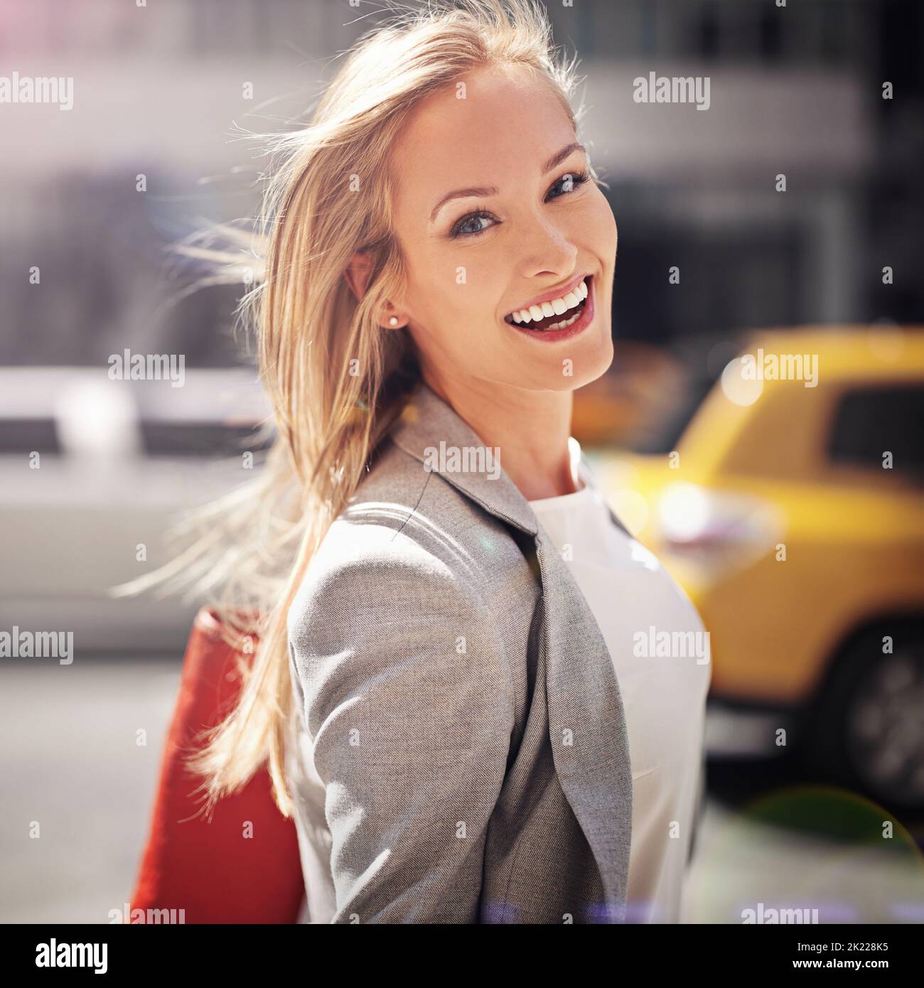 Taking on the big city. a young businesswoman traveling Stock Photo - Alamy