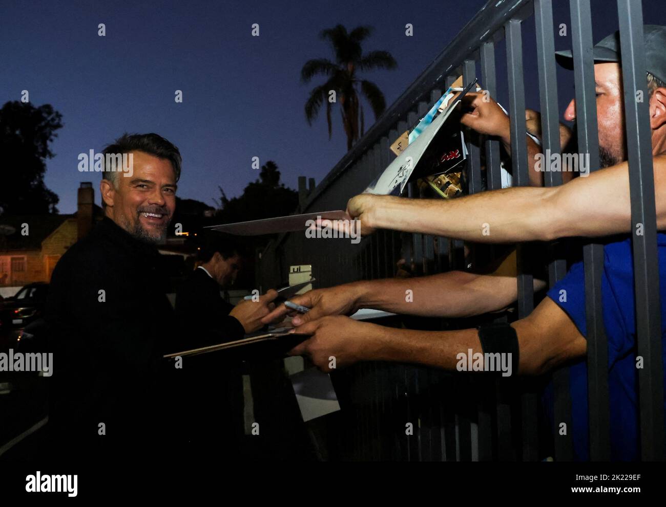 Cast member Josh Duhamel signs autographs as he attends a premiere for the film 'Bandit' in Los Angeles, California, U.S. September 21, 2022.  REUTERS/Mario Anzuoni Stock Photo