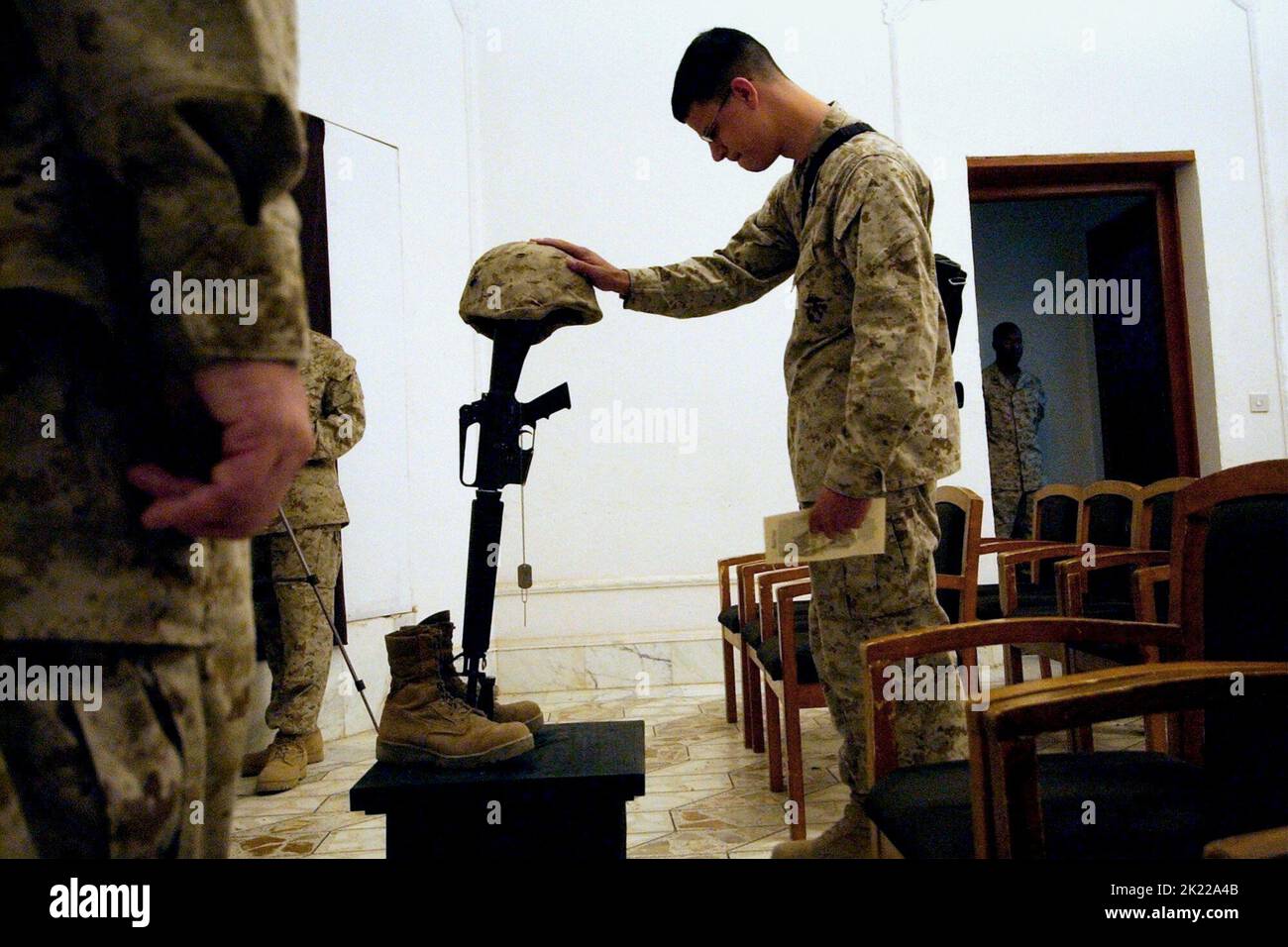 U.S. MARINE PAYS HIS RESPECTS, THE GROUND TRUTH: AFTER THE KILLING ENDS, 2006 Stock Photo