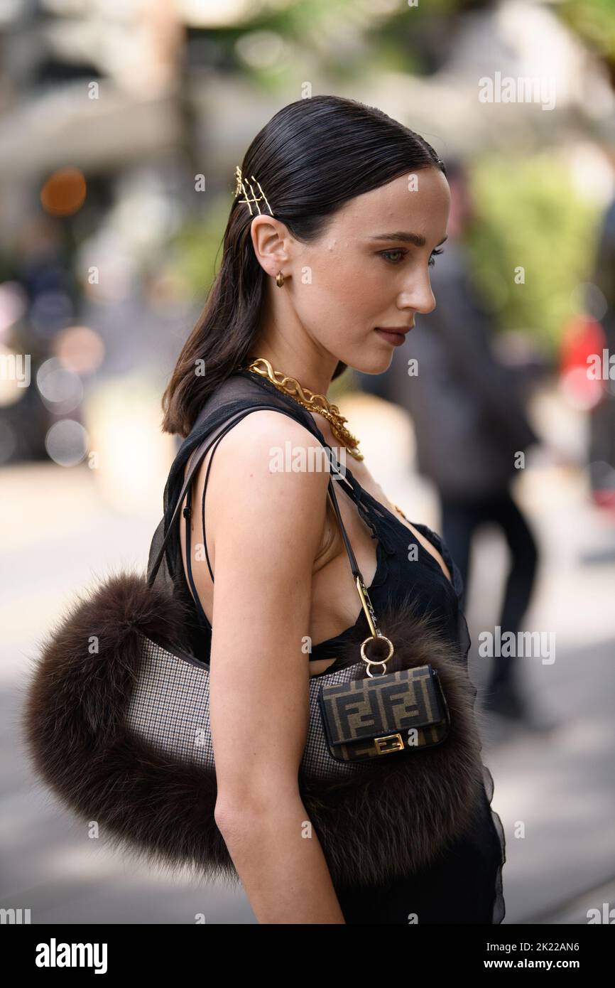 MILAN - SEPTEMBER 21: Woman with Louis Vuitton beige crocodile leather bag  and Fendi shoulder strap before Fendi fashion show, Milan Fashion Week stre  Stock Photo - Alamy