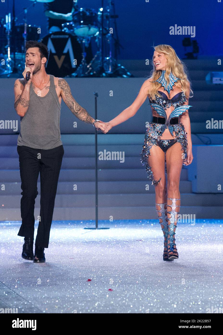 Adam Levine Of Maroon 5 Holds Hands With Model Anne V As She Walks The
