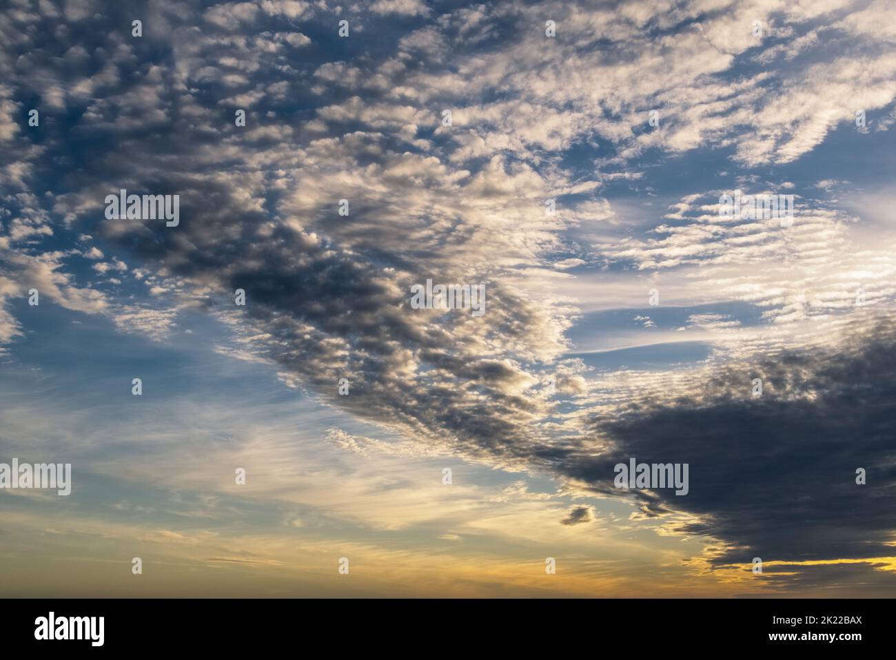 Interesting cloud formation at the sunset. Stock Photo