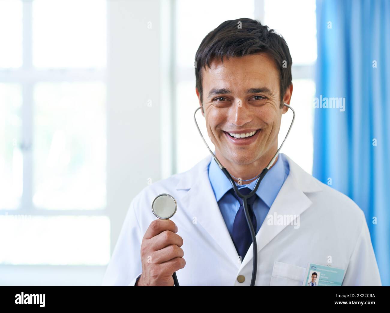 Lets find out whats in there portrait of a handsome young doctor