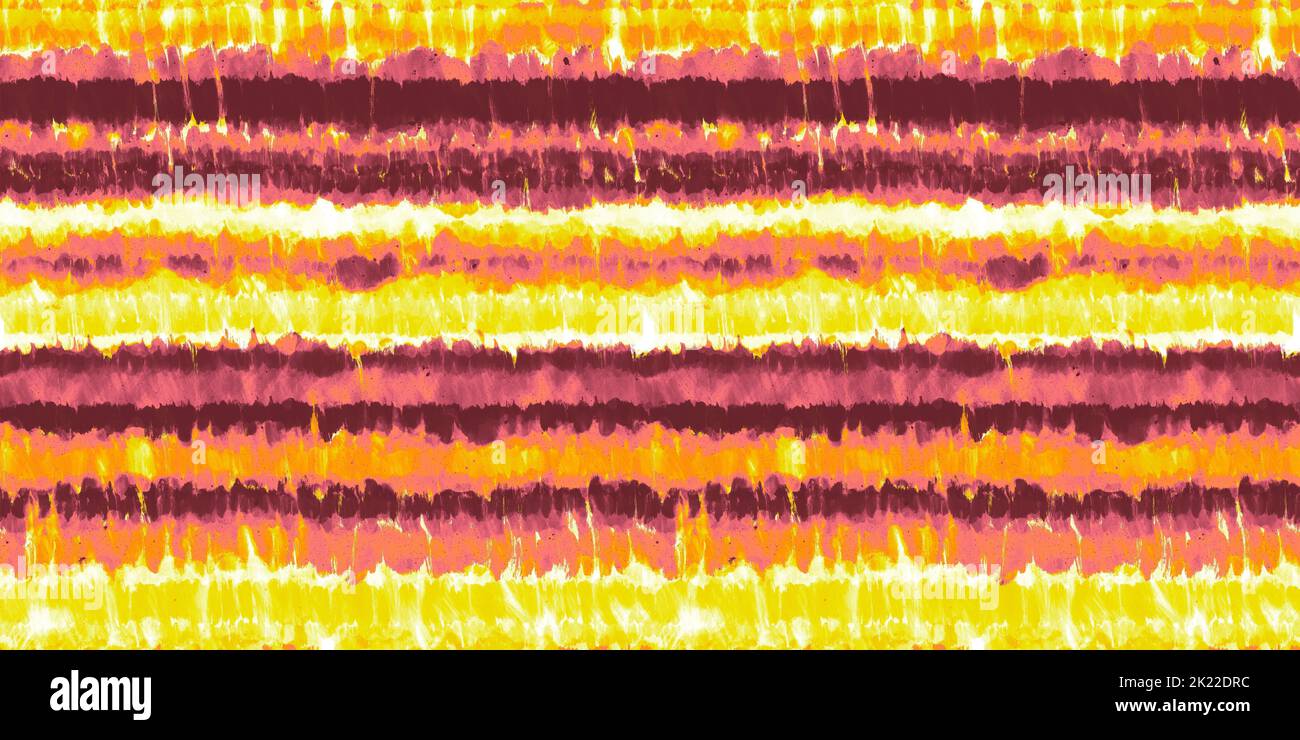 Seamless Hand Painted Speckled Loose Watercolor Tie dye Ombre Shibori Stripes pattern in a bright orange, pink and yellow dopamine dressing style. Hig Stock Photo