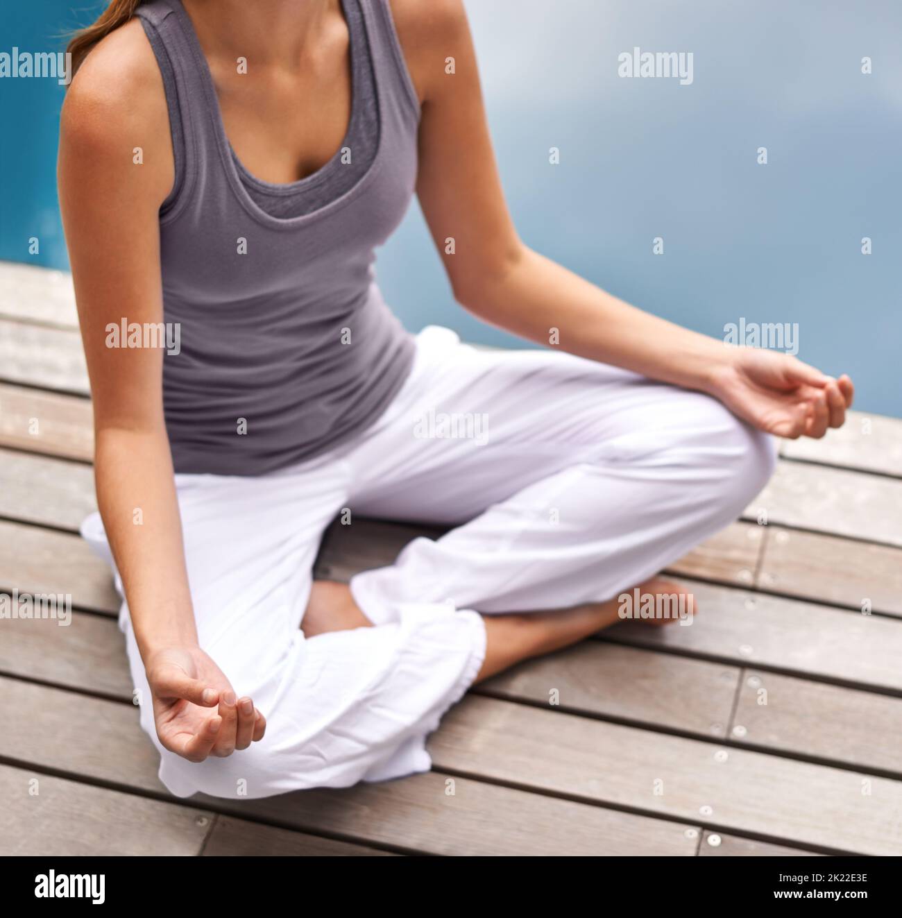 Girl sitting arms legs crossed hi-res stock photography and images - Alamy