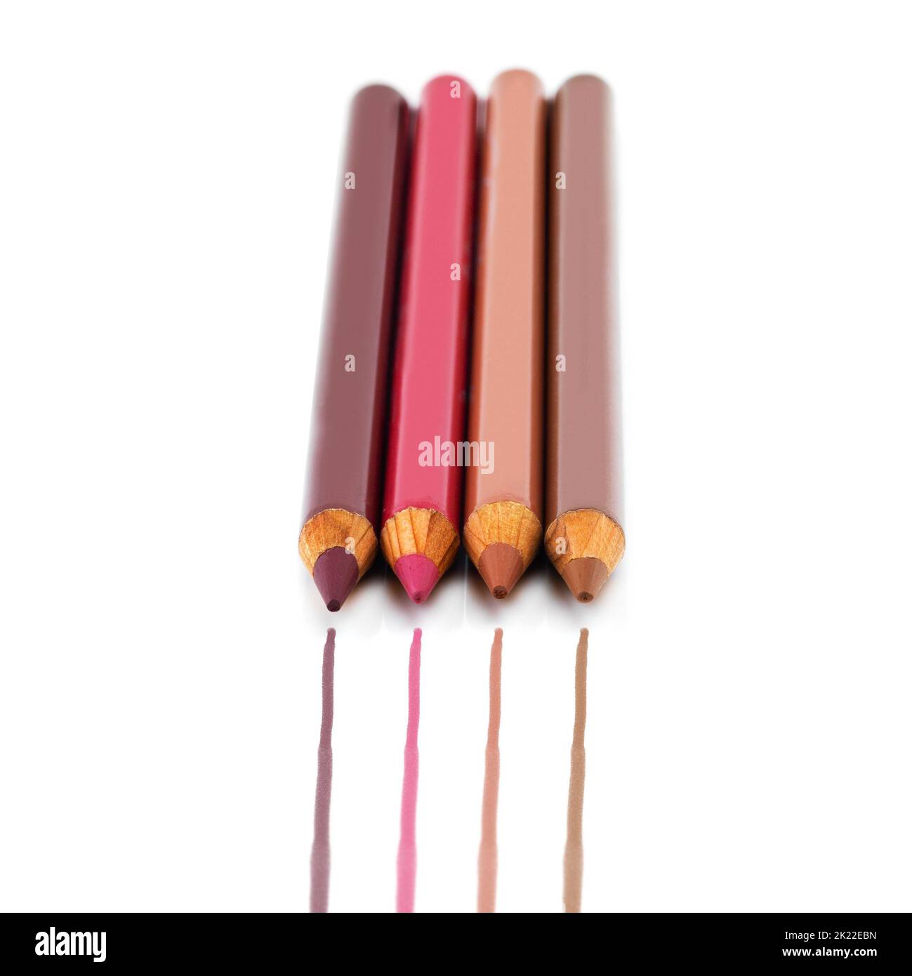 Warm colors make my heart beat faster. Studio shot of colored eye pencils isolated on white. Stock Photo