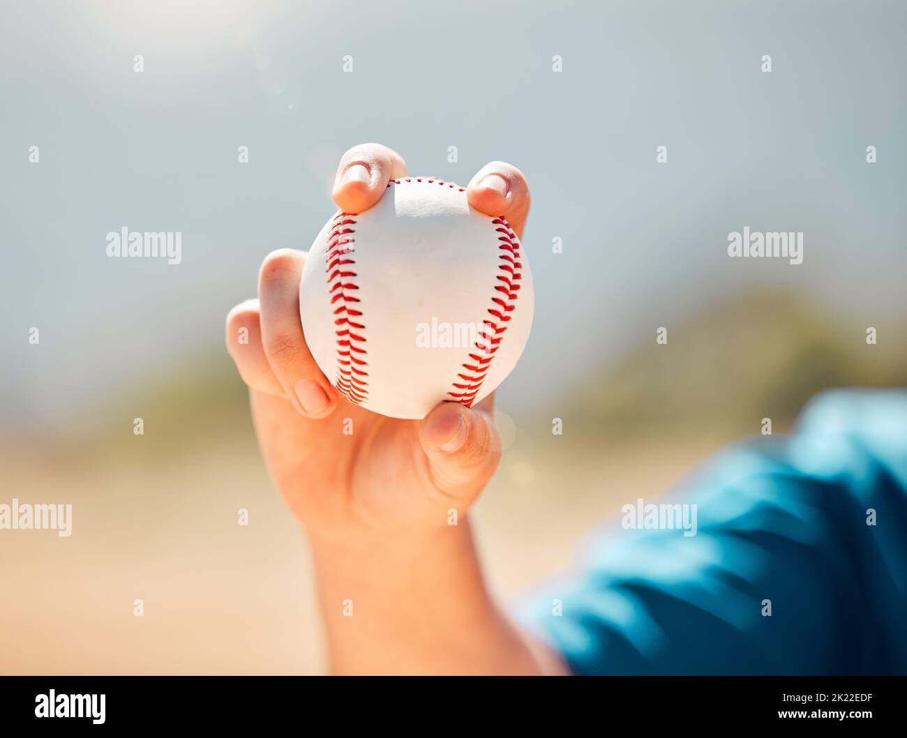 Fitness, sports and baseball training by a child practice his pitcher skills at an outdoor baseball field. Exercise, motivation and power with young Stock Photo