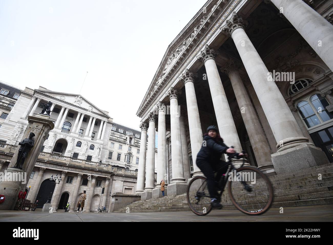 File photo dated 11/12/20 of a woman cycling past the Bank of England and the Royal Exchange in the City of London. Markets think the Bank of England will unveil the biggest hike in interest rates for over three decades when its decision makers meet on Thursday. Issue date: Thursday September 22, 2022. Stock Photo