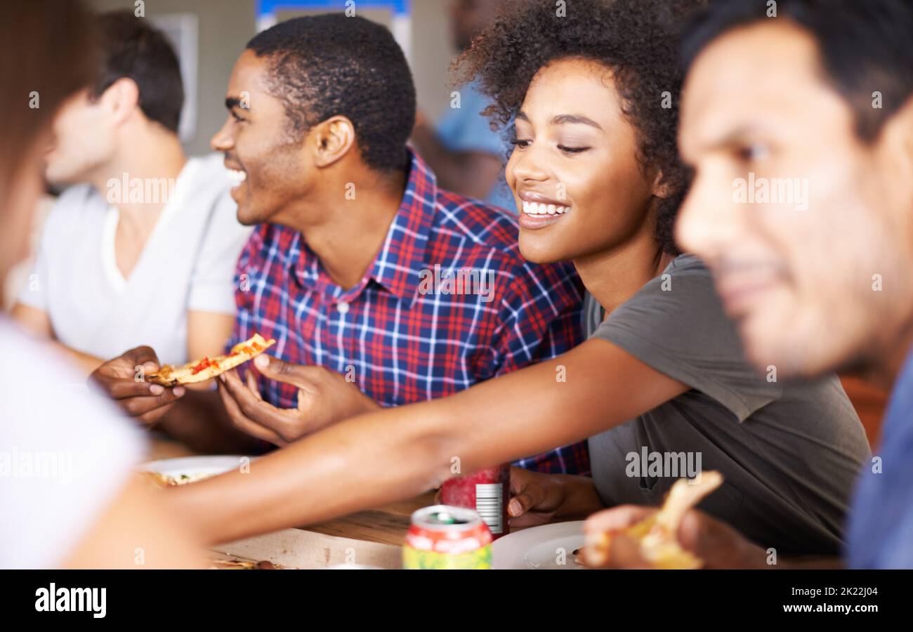 friends eating pizza together, Stock image