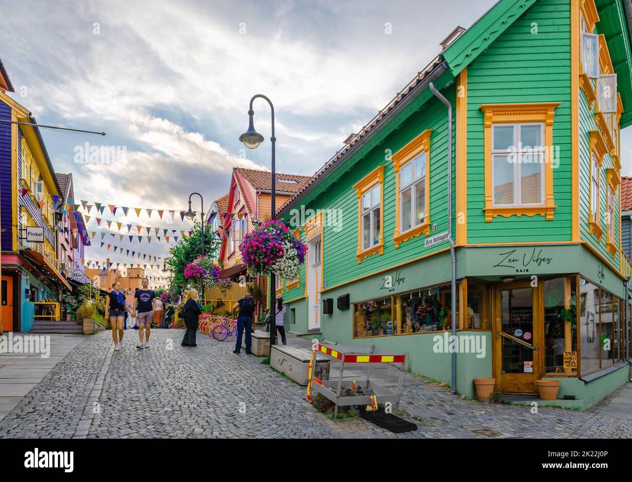 Fargegaten (Street of Colours), the famous colourful pedestrian street with shops and plenty of places for coffee and drinks in Stavanger, Norway. Stock Photo