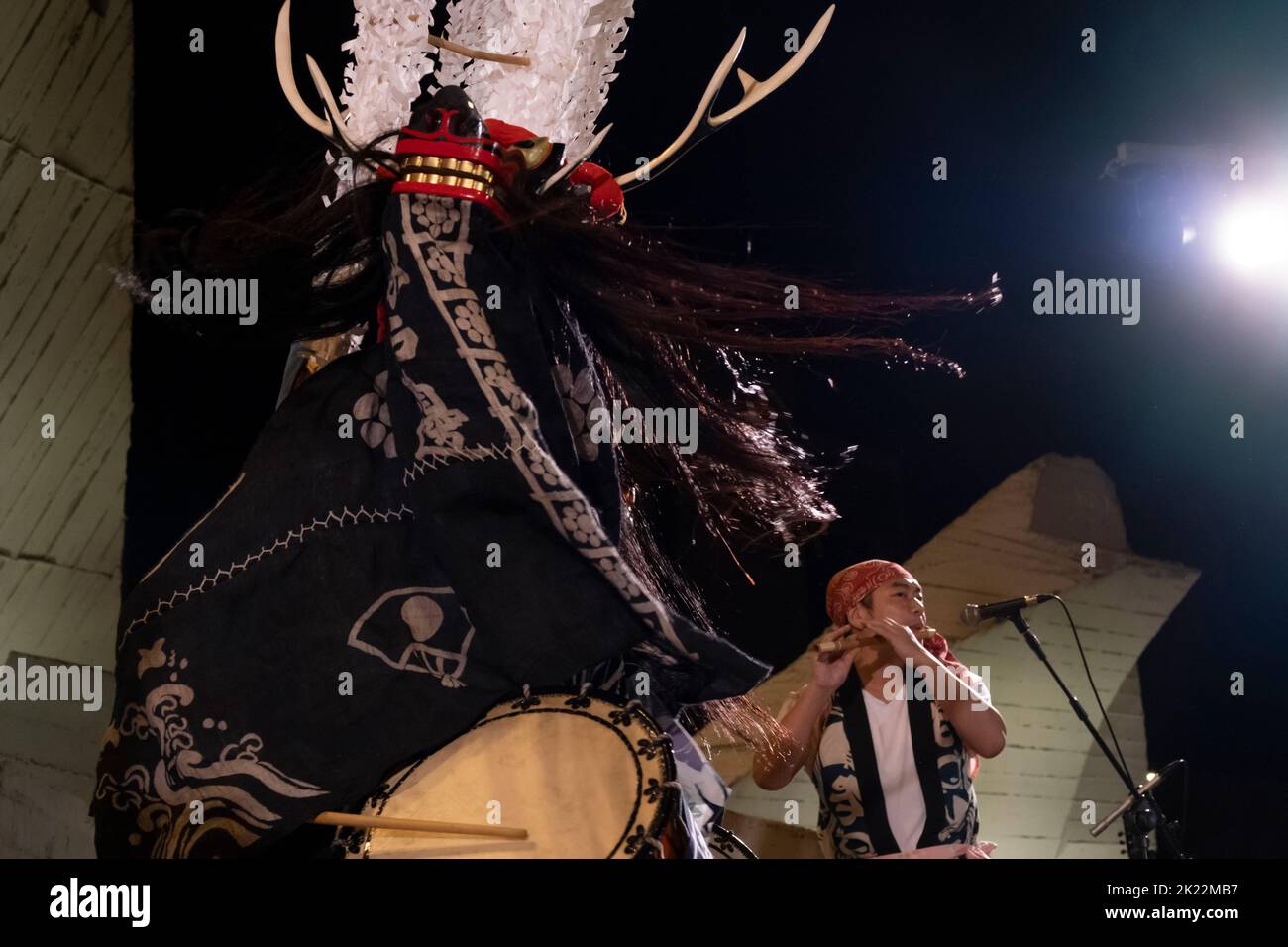 Japanese dancers perform the folk ritual Shishi-odori Deer dance in which dancers wear decorative deer heads with antlers during Israel Festival in Jerusalem. Originally,Shishi-odori belongs to Shinto (Nature worship) and was ancient ritual for nature gods and hunted animals. Stock Photo