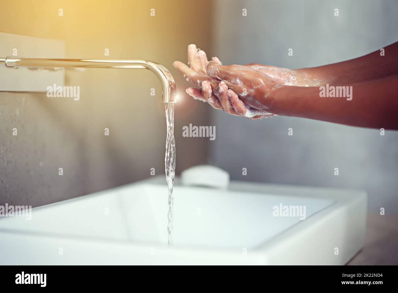 Hygienic hands. an unrecognizable woman washing her hands in the