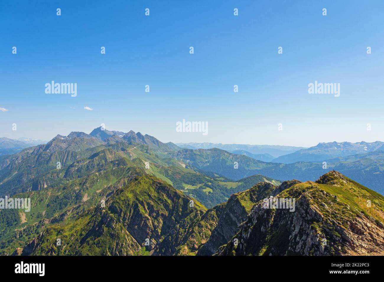 Mountain range with gorges and peaks extending into the distance of the horizon Stock Photo