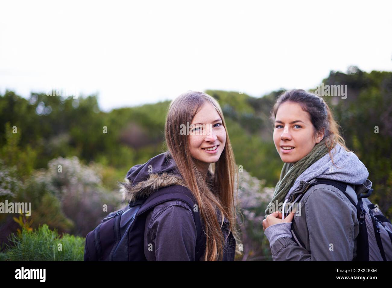 They love the outdoors. two attractive young female hikers in nature. Stock Photo
