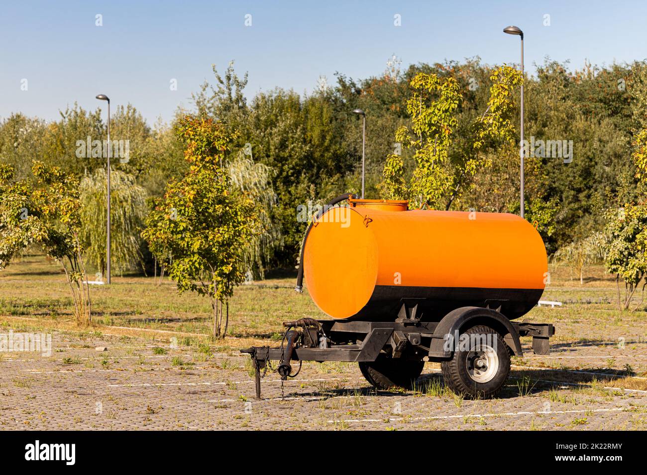 car trailer with water tank in the parking lot. water tank. tanker