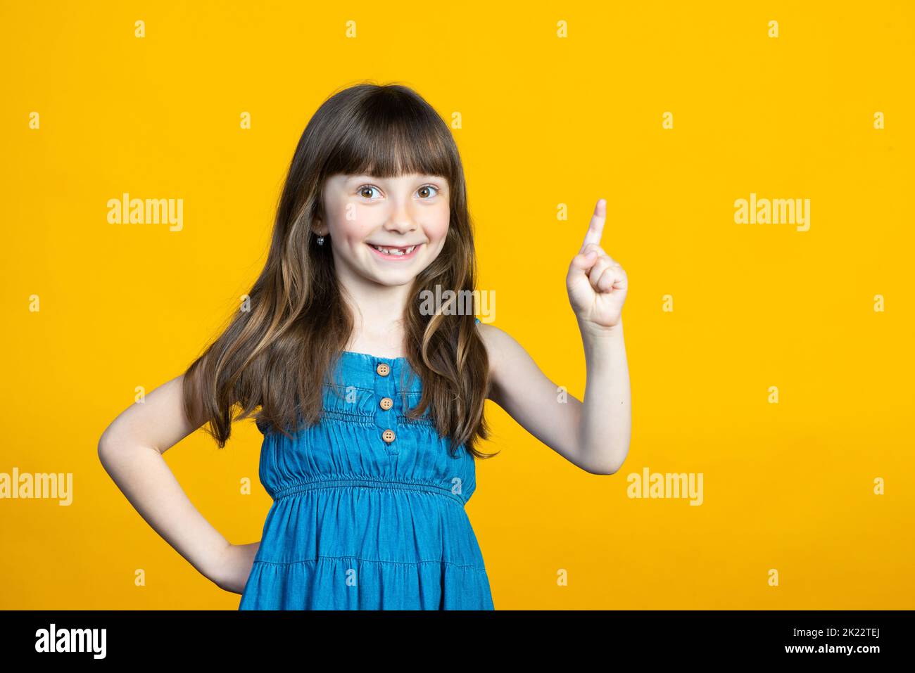 Female raising index finger hi-res stock photography and images - Alamy