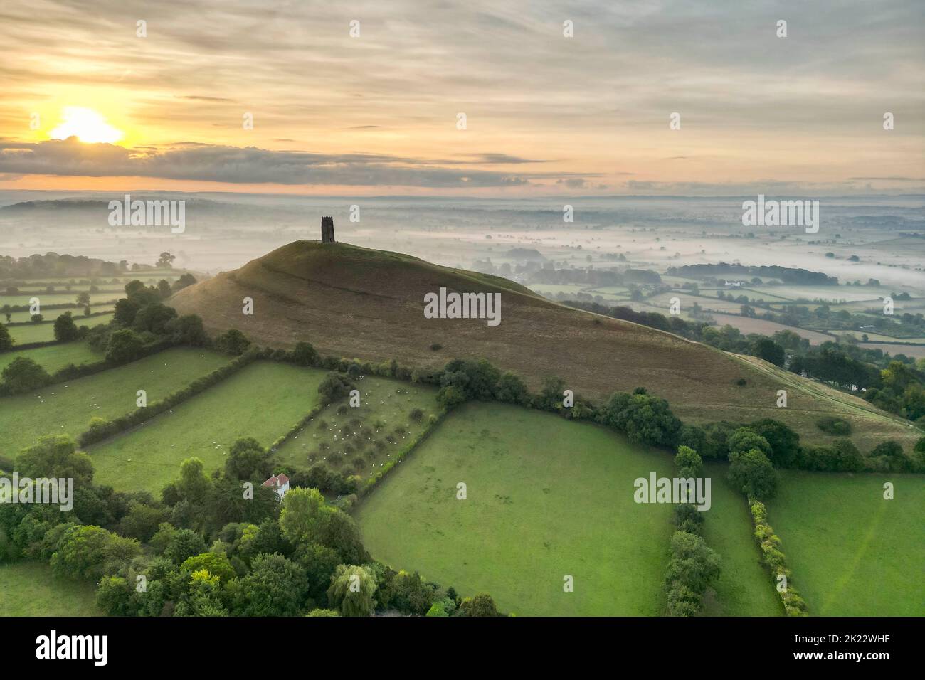 View from the air of a misty autumn sunrise at Glastonbury Tor at Glastonbury in Somerset.  Picture Credit: Graham Hunt/Alamy Stock Photo